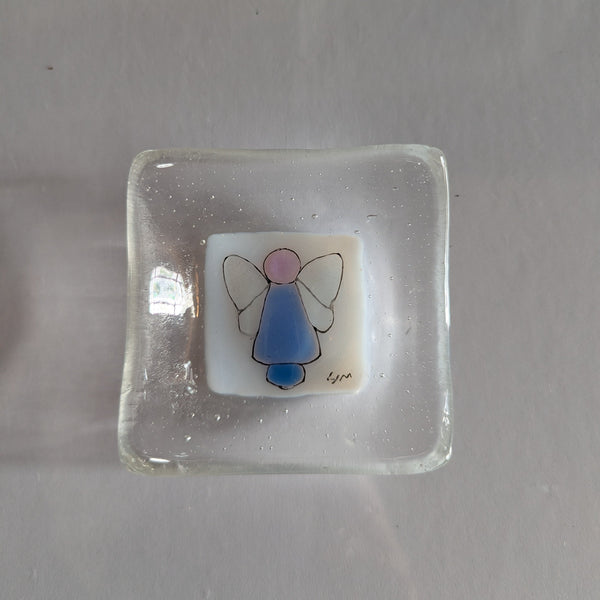 Square glass dish with angel design on a white background